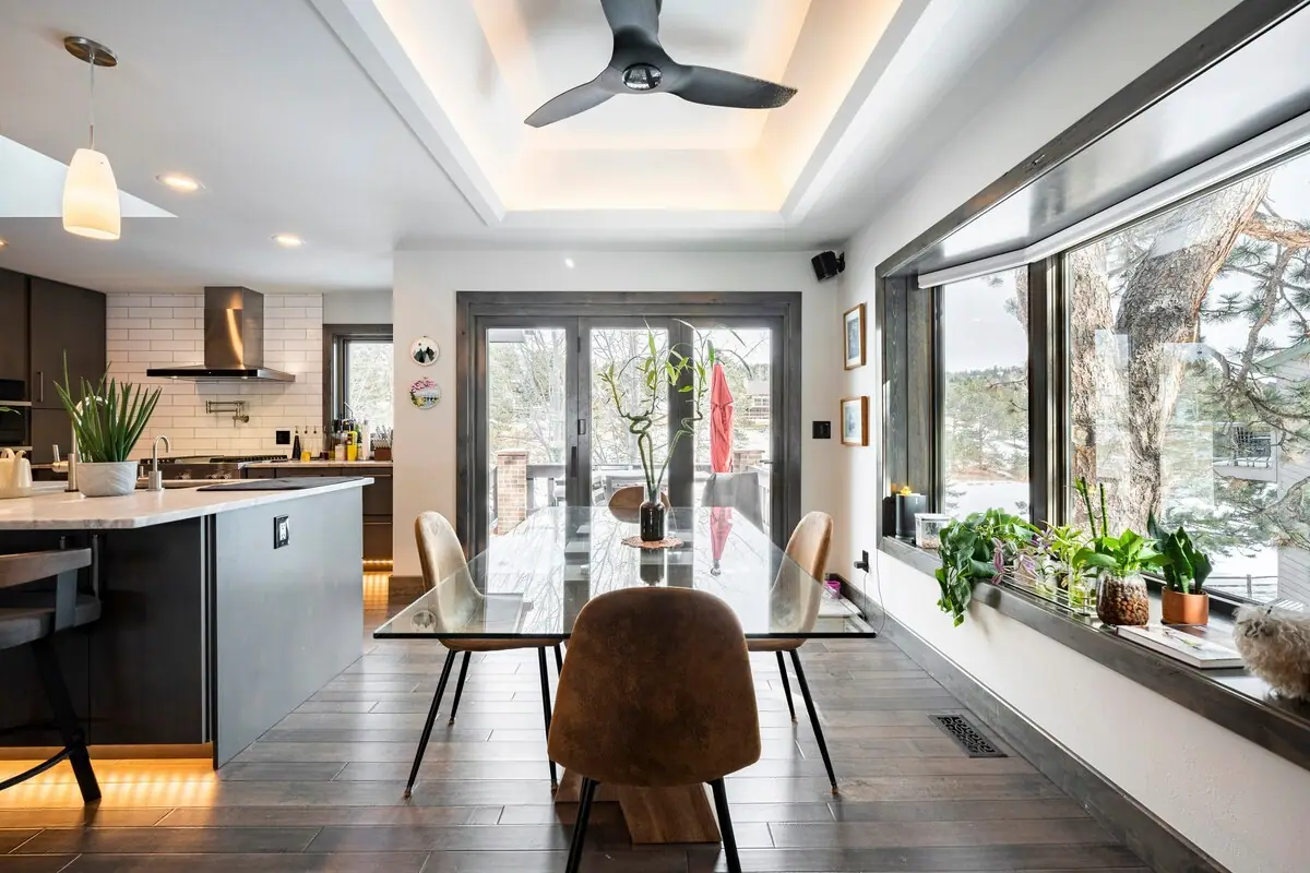 Dining by the windows — Evergreen Mountain House